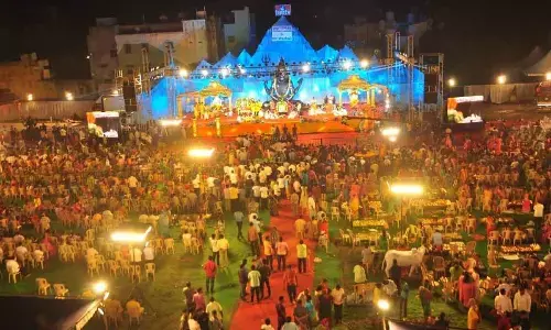 Devotees make a beeline to the Karthika Deepotsavam to mark the culmination of Karthika Maasam, organised by hmtv in Chilkaluripet in Palnadu district of Andhra Pradesh on Monday	Photo: Srinivas Guntur