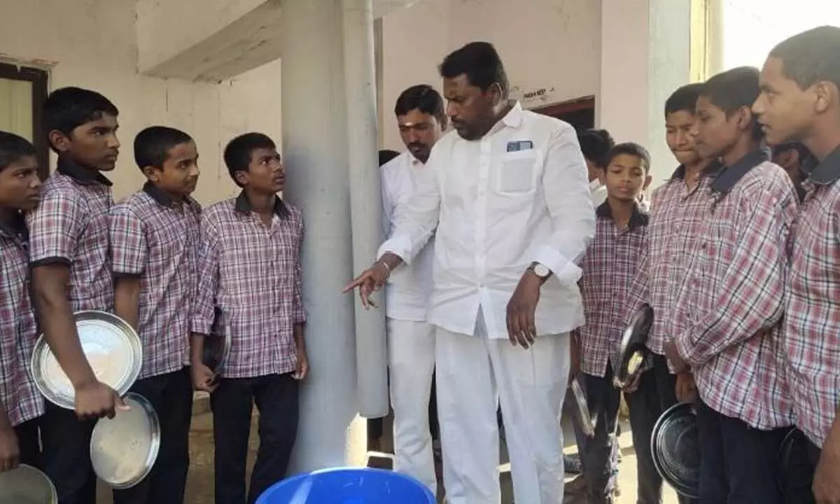 District Congress president Adluri Laxman  inspecting the Social Welfare Gurukul Hostel in Dharmapuri mandal in Jagtial district on Tuesday
