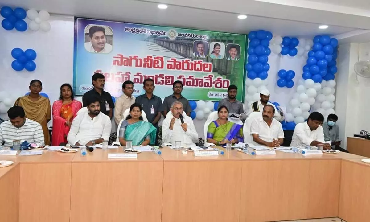 District in-charge Minister and BC Welfare, I& PR Minister Ch Srinivasa Venu Gopala Krishna addressing a meeting of district irrigation advisory board in Rajamahendravaram on Wednesday. Home Minister Taneti Vanitha and District Collector K Madhavi Latha are also seen.