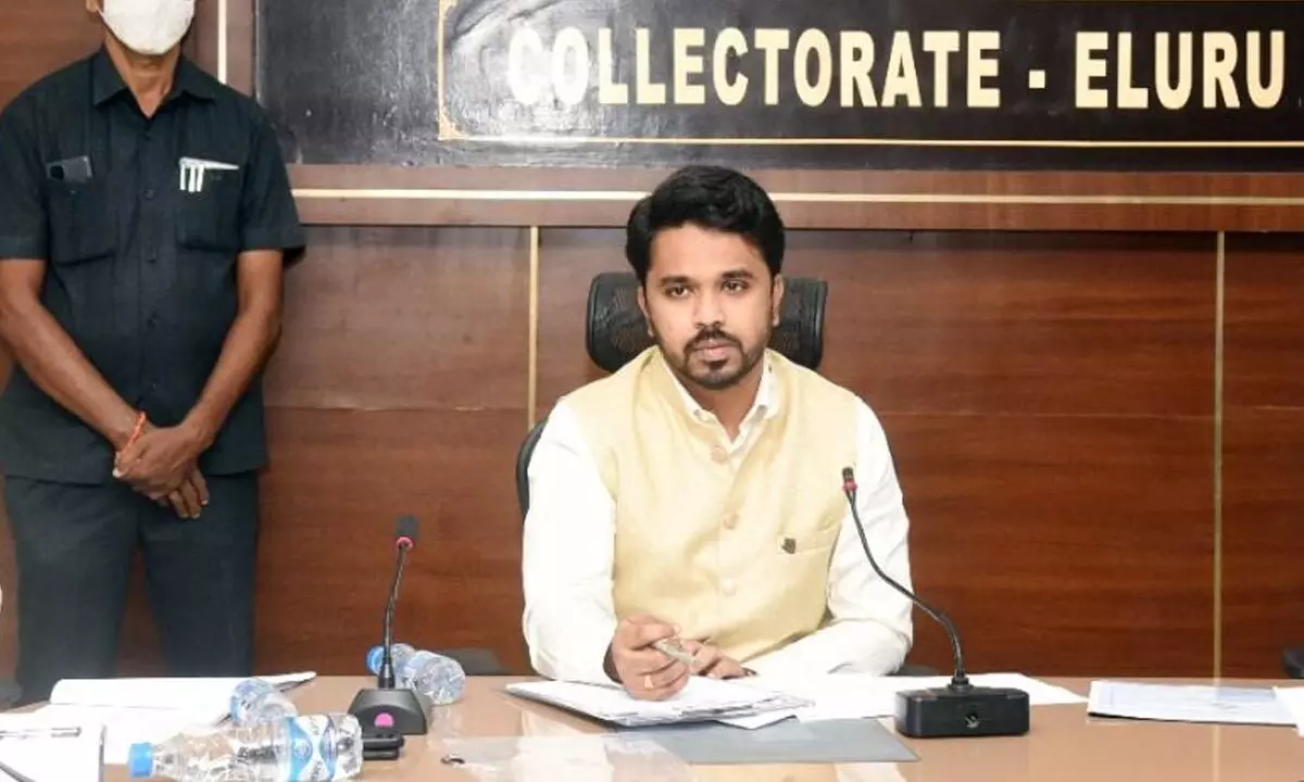 MV Seshagiri Babu, Commissioner of Intermediate Education and State Observer of Voter Lists Special Amendment Programme (right) and District Collector V Prasanna Venkatesh (middle) at a meeting at the Collectorate in Eluru on Wednesday