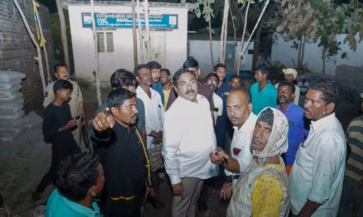 Minister for Panchayat Raj Errabelli Dayakar Rao inspecting the construction of classrooms in the primary school at Sannur village under Raiparthy mandal of Warangal district on Thursday night