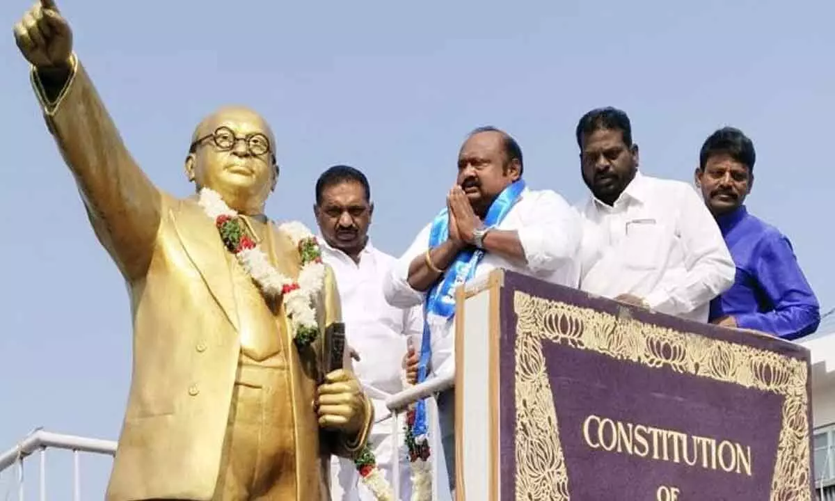 Civil Supplies Minister Gangula Kamalakar paying tributes to the statue of  Dr BR Ambedkar in Karimnagar on Saturday