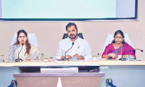 Roads & Building Minister Dadisetti Ramalingeswar Rao addressing the Irrigation Advisory Board meeting at the Collectorate in Kakinada on Saturday. District Collector Krithika Shukla and Kakinada MP Vanga Geetha are also seen.
