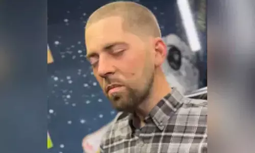 The barber gives the man a buzz cut and it instantly makes him look younger, fresh and clean.