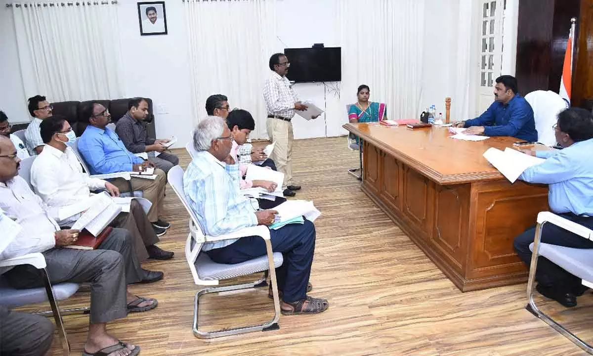 Krishna District Collector P Ranjith Basha addressing industries and exporting committee members at a review meeting at the Collectorate in Machilipatnam on Monday