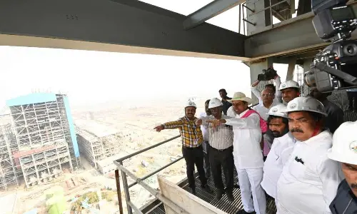 Chief Minister K Chandrashekar Rao inspects the progress of construction work of Yadadri Thermal Power Plant at Damaracherla in Nalgonda district on Monday