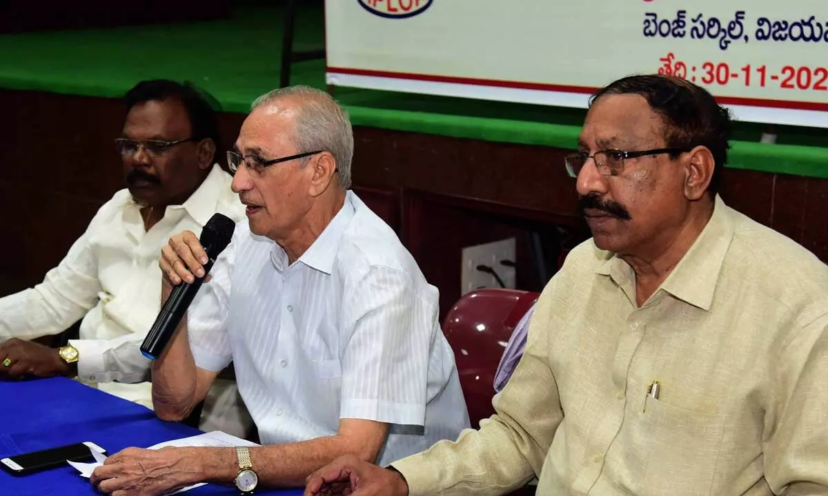 AP Lorry Owners Association State president P Gopala Naidu speaking at a round-table meeting at Krishna District Lorry Owners Association Hall in Vijayawada on Wednesday
