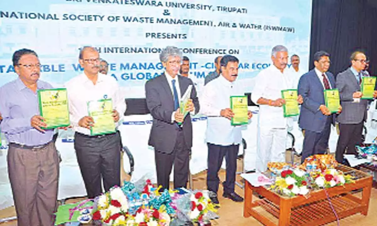 Minister Peddireddi Ramachandra Reddy, SVU vice-chancellor Prof K Raja Reddy and others releasing the conference proceedings during the international conference at SV University on Thursday