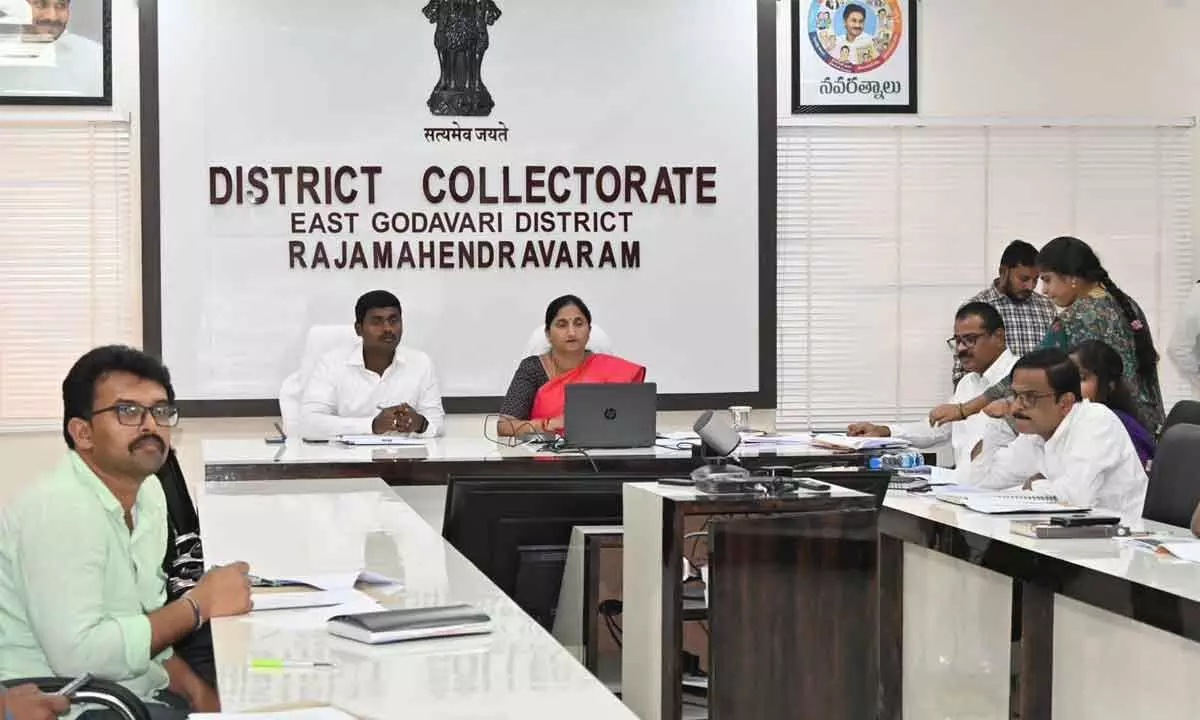 District Collector Dr K Madhavi Latha and Electoral Officers attending a videoconference, organised by the Central Election Commission, from Rajahmundry Collectorate on Thursday