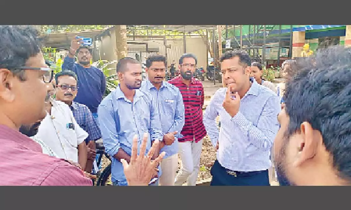 District Collector Himanshu Shukla interacting with farmers during RBK inspection at Ravulapalem on Thursday