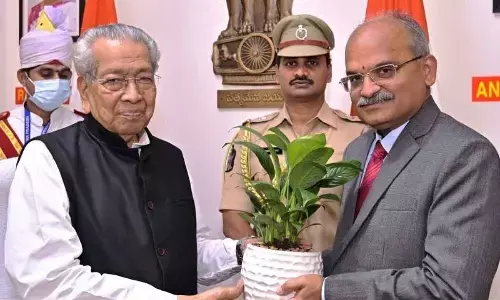 Newly-appointed Chief Secretary  K S Jawahar Reddy meeting Governor Biswabhusan Harichandan at Raj Bhavan in Vijayawada on Friday