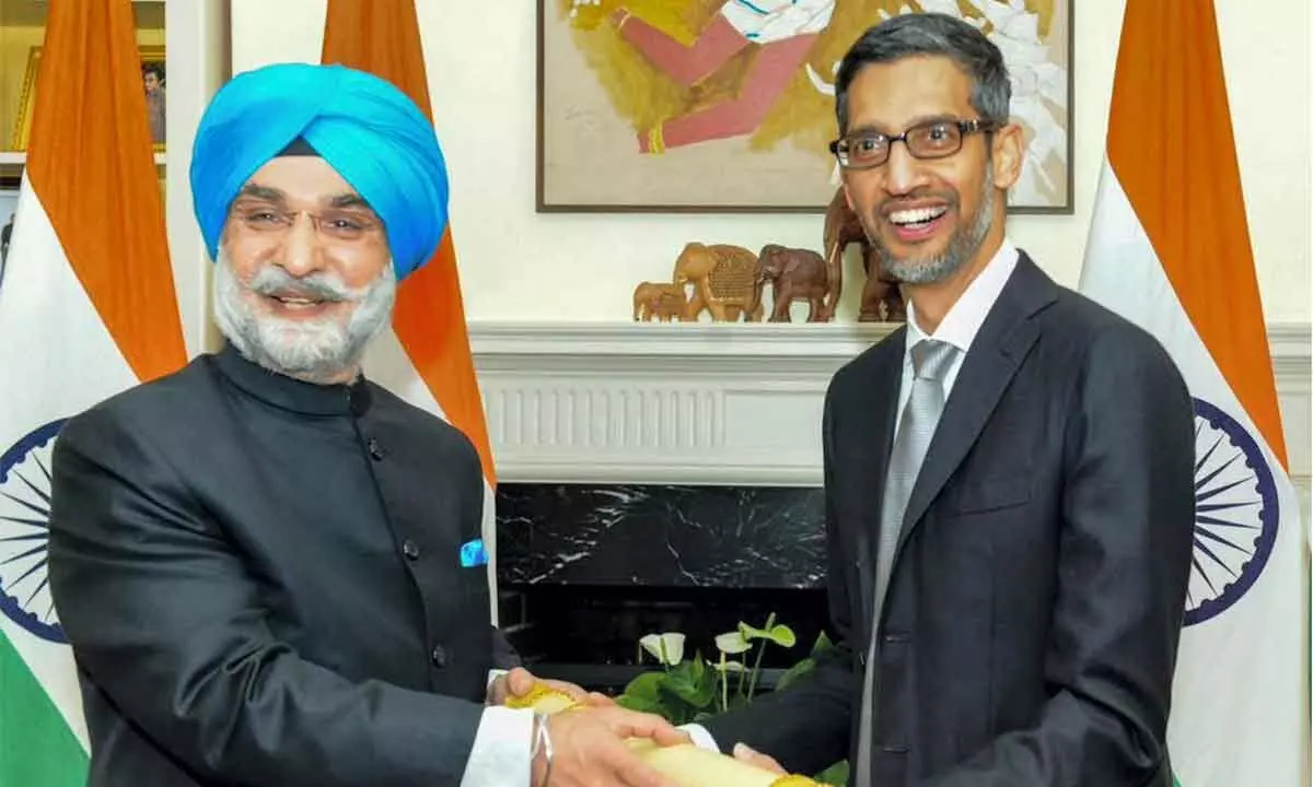 Ambassador to the US Taranjit Singh Sandhu hands over the Padma Bhushan award to Google and Alphabet CEO Sundar Pichai in San Francisco on Friday