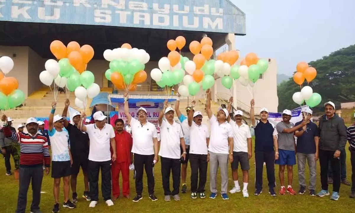 Releasing the balloons, CMD of RINL Atul Bhatt and other officials flags off the run in Visakhapatnam on Sunday