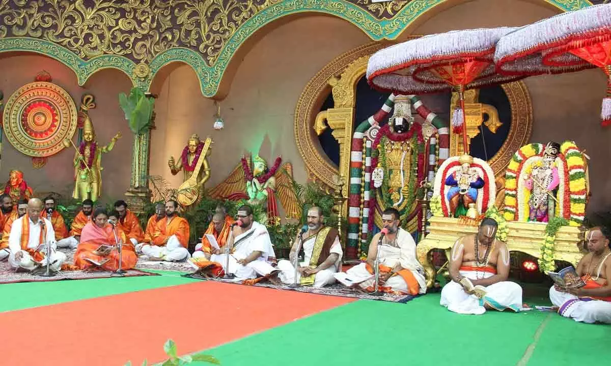 Vedic scholars, TTD EO AV Dharma Reddy and devotees taking part in Akhanda Gita Parayanam at Nada Neerajanam platform at Tirumala on Sunday