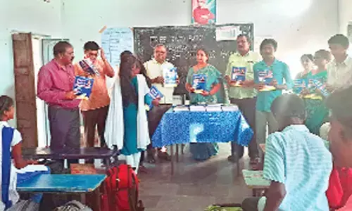Basic English grammar books distributed to SSC students at Velikicherla  ZPHS on Saturday