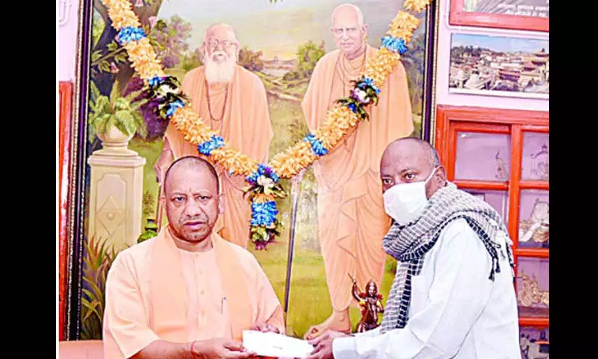 CM Yogi gives Rs 2 lakh to paralysis patient from CMs Discretionary Fund
