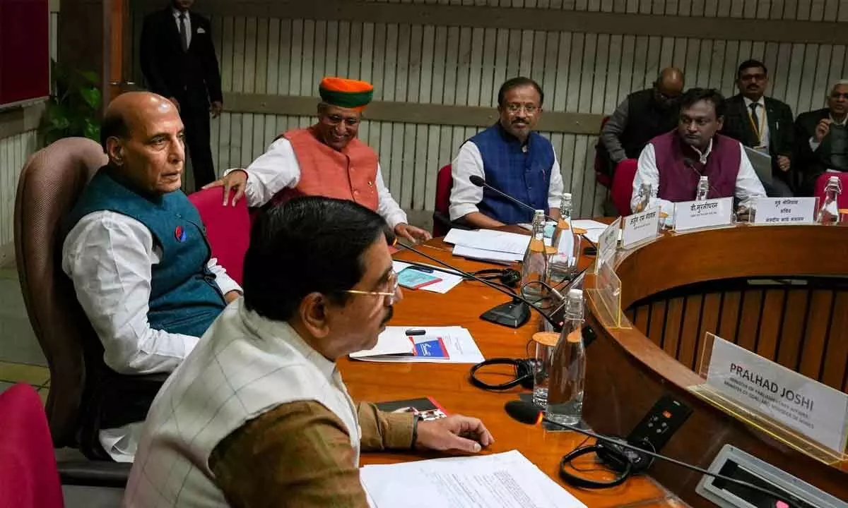 Defence Minister Rajnath Singh with Union Minister for Parliamentary Affairs Pralhad Joshi and Union MoS Parliamentary Affairs Arjun Ram Meghwal during an all-party meeting ahead of the Winter Session of Parliament, at Parliament House in New Delhi on Tuesday