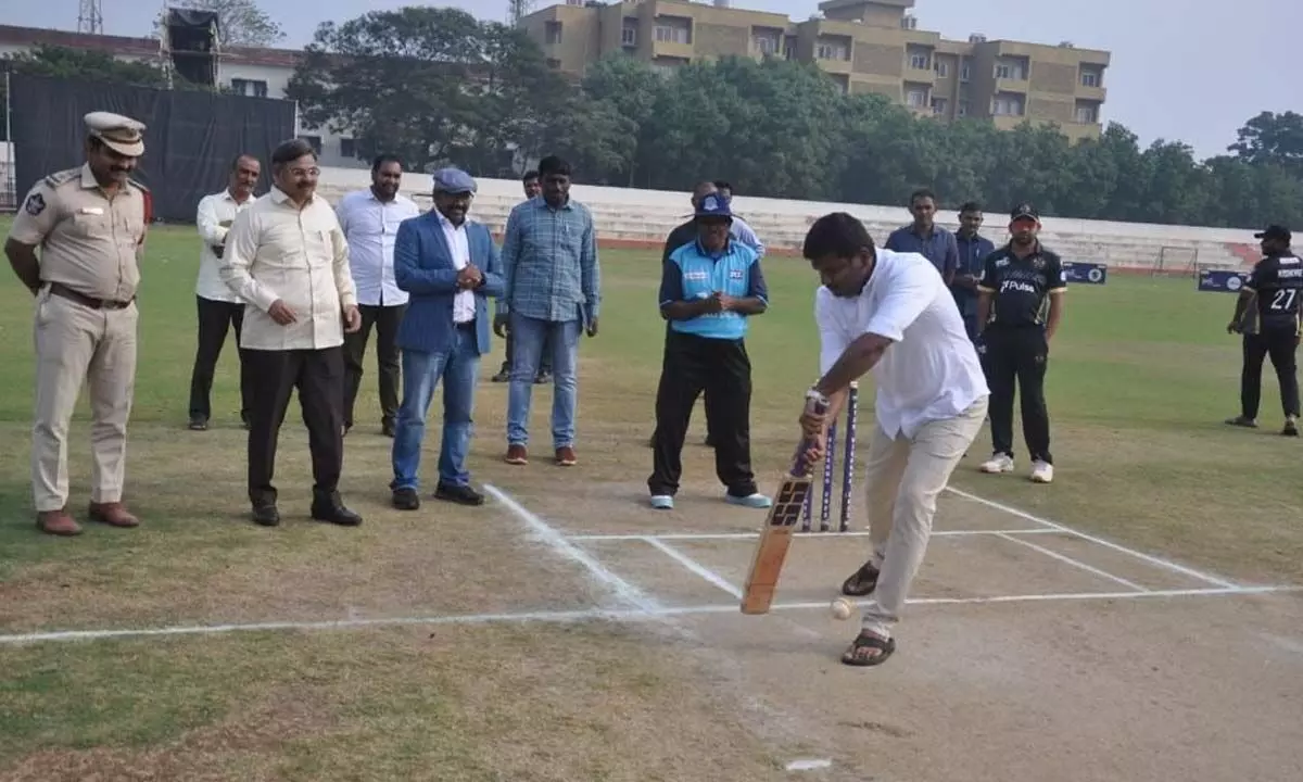IT Minister Gudivada Amarnath playing cricket at Doctors T20 grand finale in Visakhapatnam on Tuesday