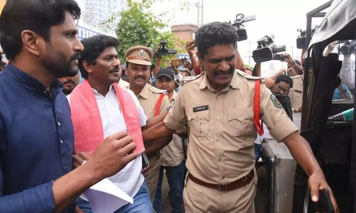 Police taking JSP leaders into custody during the protest in Visakhapatnam on Tuesday