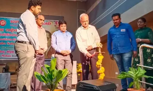 On the death anniversary of  Dr BR Ambedkar, DRM Shivendra Mohan lighting the lamp at SCR divisional headquarters in Vijayawada on Tuesday