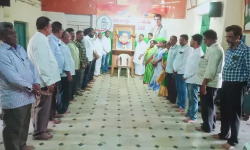 DCC president M Sudhakar Babu and other Congress leaders paying floral tributes to Dr B R Ambedkar on the occasion of his death anniversary at the party office in Kurnool on Tuesday