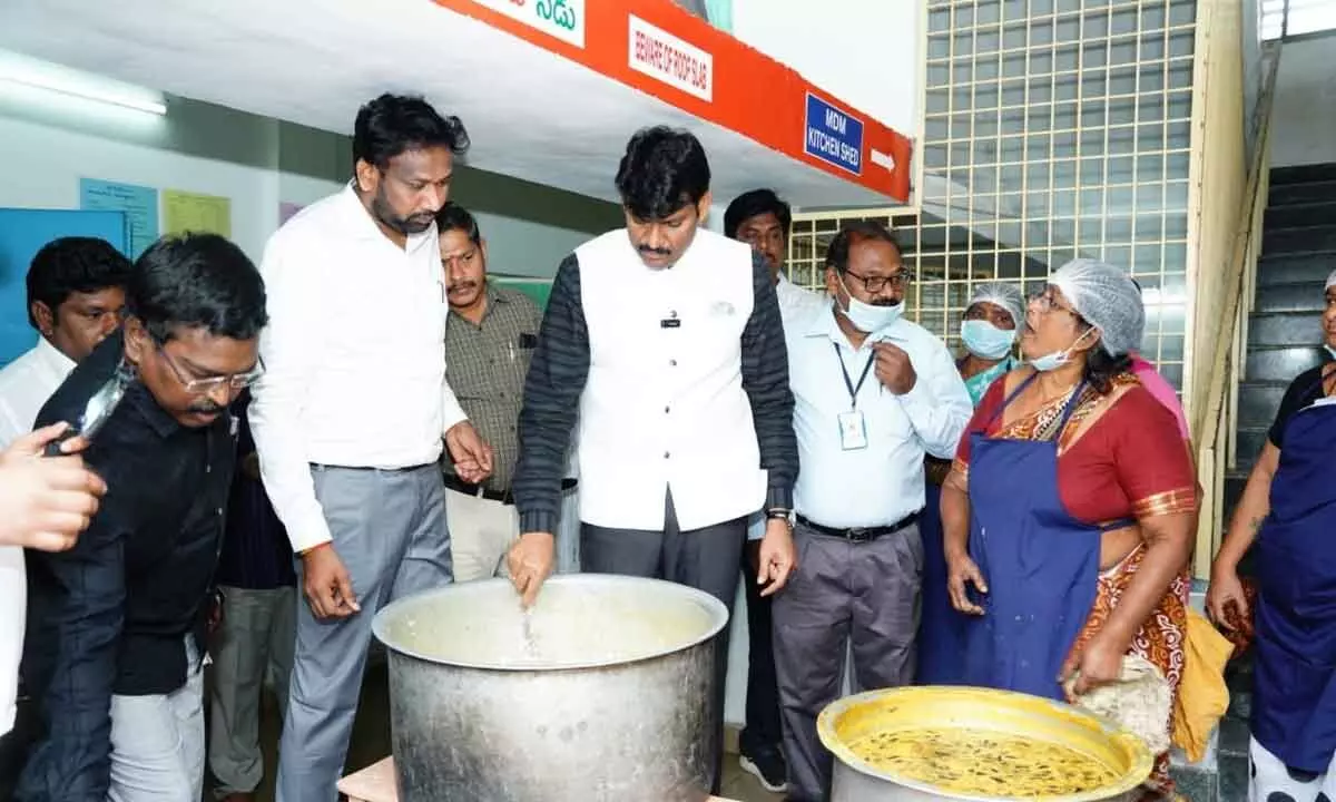State Food Commission Chairman Ch Vijay Prathap Reddy inspecting food quality of mid-day meal scheme at a school in Rajahmundry on Friday