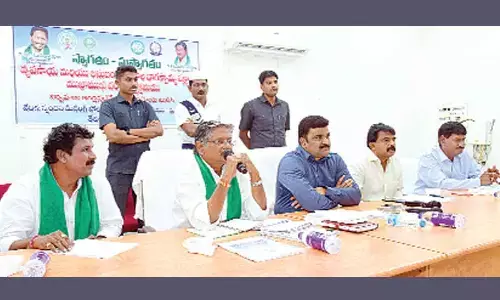 State Agriculture Mission vice-chairman M V S Nagi Reddy addressing the officials and farmers at Machilipatnam on Friday