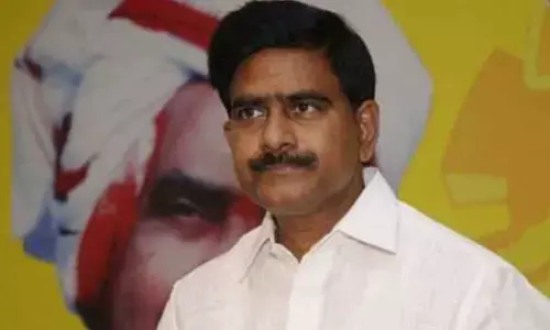 Devineni Uma stages protest to purchase of wet grains in NTR district, arrested