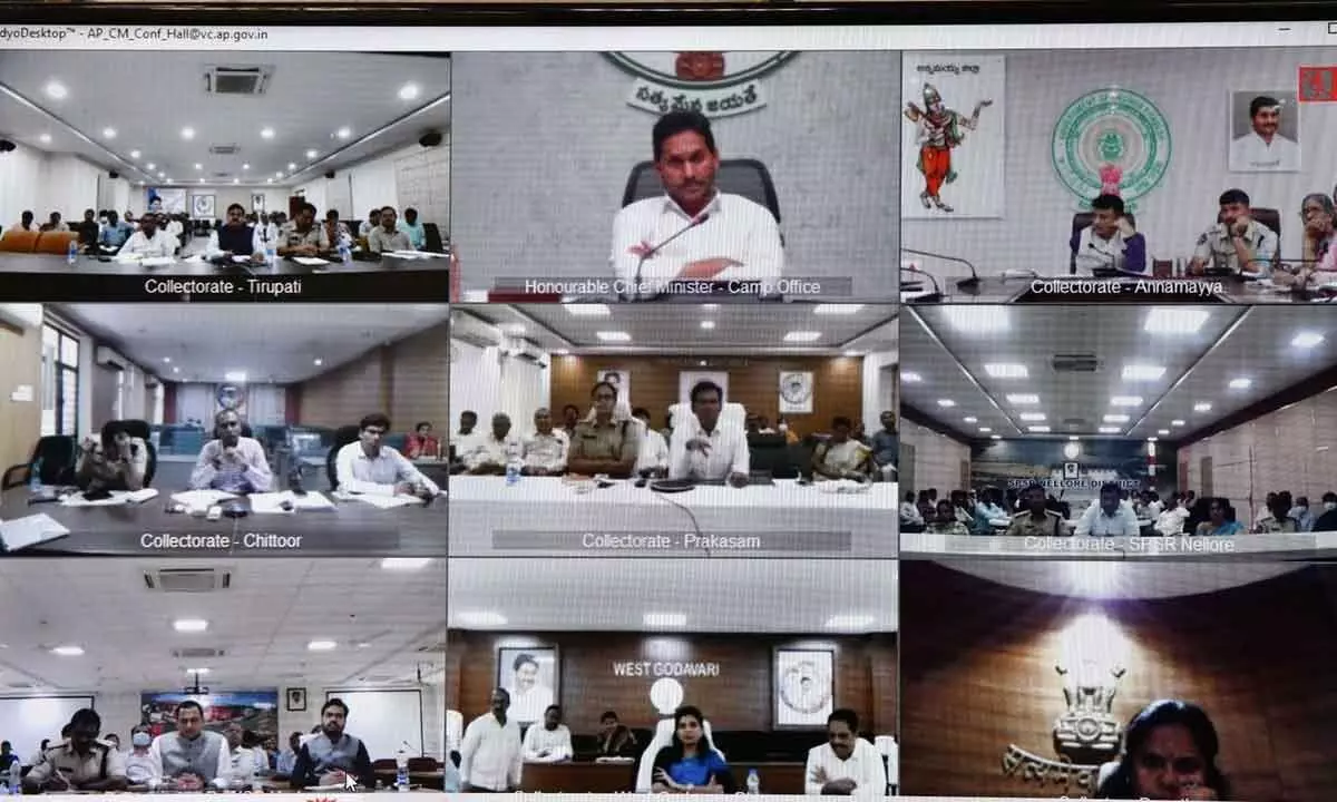Chief Minister Y S Jagan Mohan Reddy holds a video conference with district collectors on effect of Cyclone Mandous at his camp office in Tadepalli on Monday