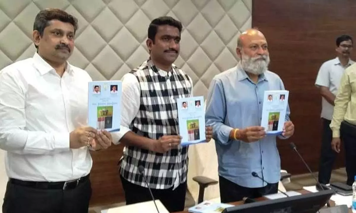 Chief Advisor to Chief Minister Ajay Kallam and Commissioner of Land Records and Survey Settlement Siddharth Jain releasing Sada Bainama regularisation book at a training programme in Mangalagiri on Tuesday