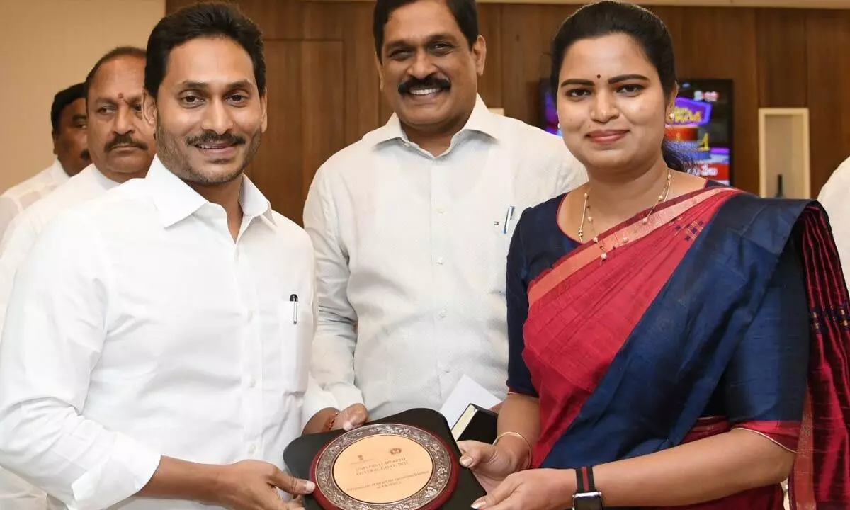 Minister for medical and health Vidadala Rajini shows the national level award presented to the state recently in Varanasi to Chief Minister Y S Jagan Mohan Reddy at the Secretariat on Tuesday. Principal secretary (medical and health)  M T Krishna Babu is also seen.