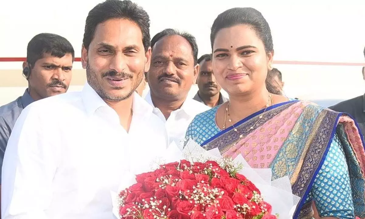 Minister Vidadala Rajini handing over a bouquet to Chief Minister YS Jagan Mohan Reddy in Visakhapatnam on Wednesday