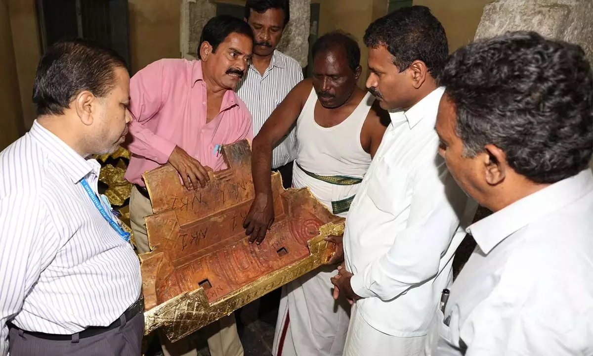 TTD JEO Veerabrahmam inspecting the gold plating works going on at Sri Govindaraja Swamy temple in Tirupati on Wednesday.
