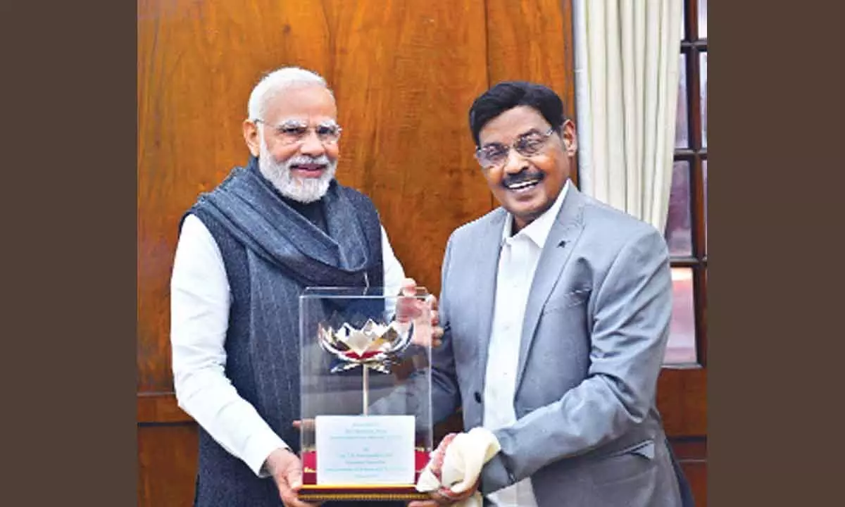 SRM Group of Educational Institutions Founder-Chancellor Dr TR Paarivendhar presenting a souvenir to Prime Minister Narendra Modi in Delhi on Friday