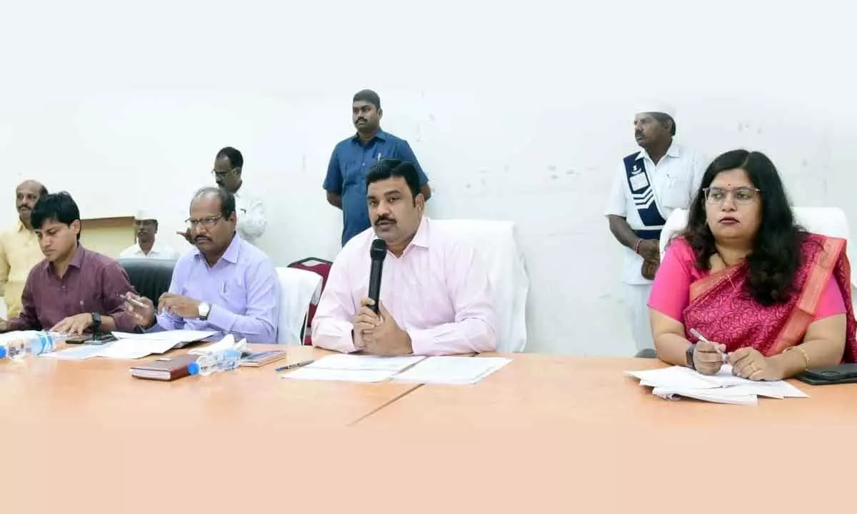 Krishna District Collector P Ranjith Basha addressing the officials during a meeting in Machilipatnam on Friday