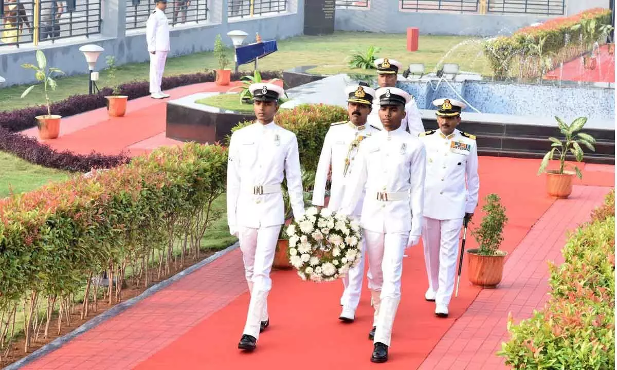 Navy personnel taking part in wreath laying ceremony at ‘Victory at Sea’ War Memorial in Visakhapatnam on Friday