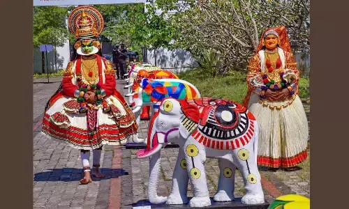 Artistes wearing Kathakali costume at the opening ceremony of the Kochi Design Week in Kochi on Friday