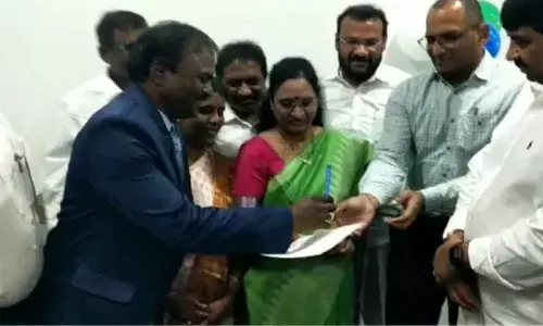 Yadala Ashok Babu taking charge as Dr YSR Aarogyasri scheme Special Officer in Mangalagiri on Friday