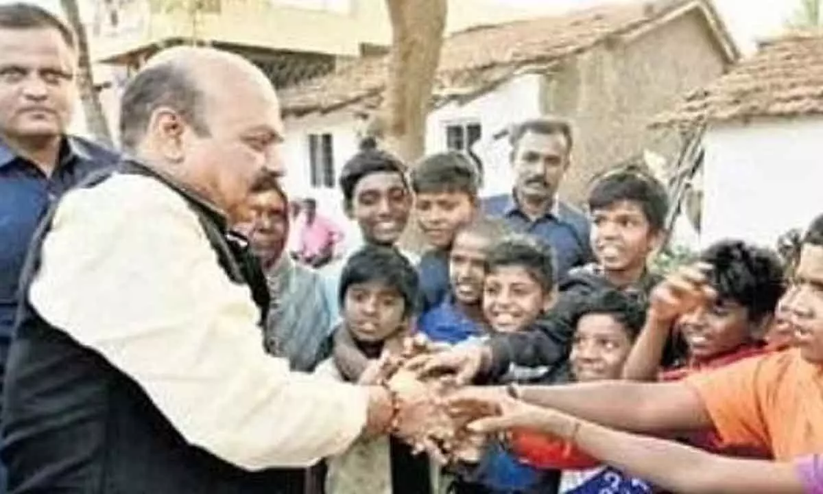CM Basavaraj Bommai meets children in Shiggaon on Saturday