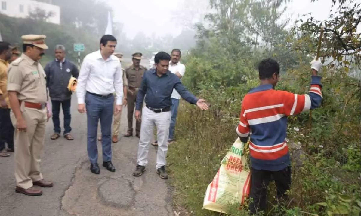 District Collector Sumeet Kumar supervising the clean drive programme in the surroundings of Metta Bungalow near Gonduru on Monday
