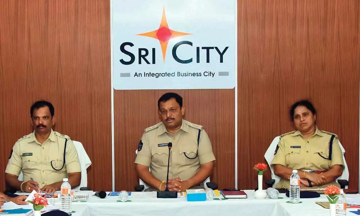 Tirupati SP P Parameswar Reddy holding a review meeting with police officers in Sri City on Monday. ASPs Kulasekhar and Vimala Kumari are also seen.