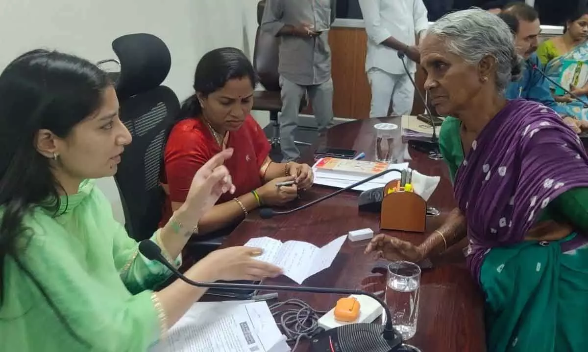 Mayor Dr R Sirisha and Municipal Commissioner Anupama Anjali receiving petitions at Spandana programme at the Municipal Corporation office in Tirupati on Monday