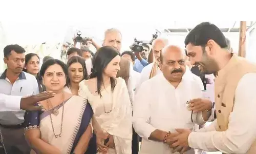 Chief Minister Basavaraj Bommai greets Vivek Hebbar, son of Labour Minister Shivaram Hebbar on Sunday