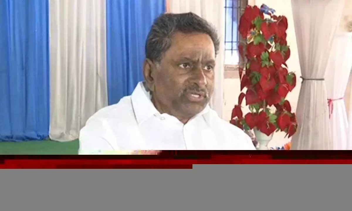 Former Minister DL Ravindra Reddy addressing a press meet in Mydukuru on Wednesday