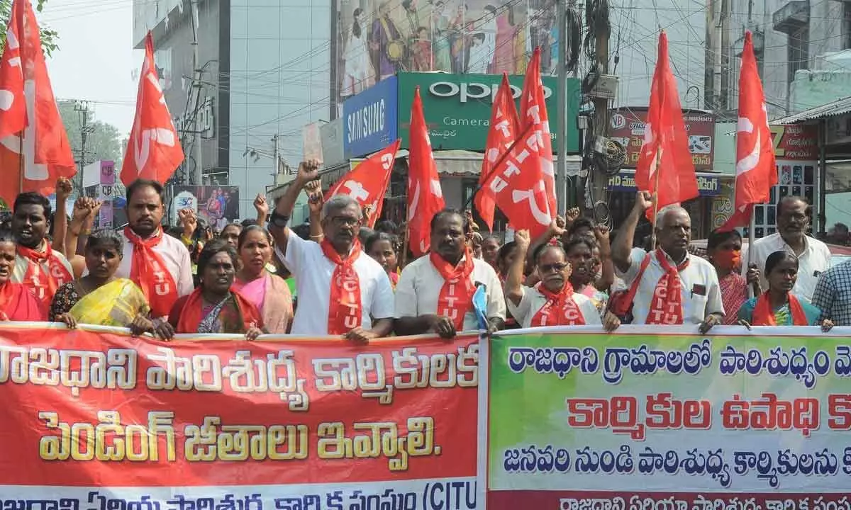 Amaravati sanitation workers and CPM state executive member Ch Baburao and party leaders staging a protest at CRDA office in Vijayawada on Thursday  				         Photo Ch Venkata Mastan