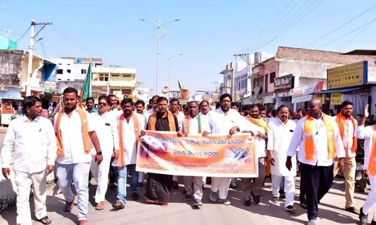 BJP leaders holding a protest rally in Bhoodan Pochampally demanding closure of pollution emitting industries, here on Friday.