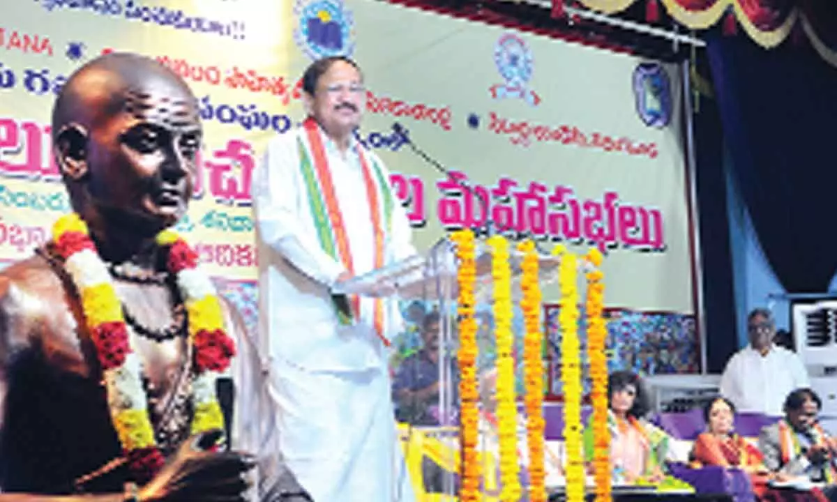 Former Vice-President M Venkaiah Naidu addressing the inaugural session of World Telugu Writers Conference in Vijayawada on Friday