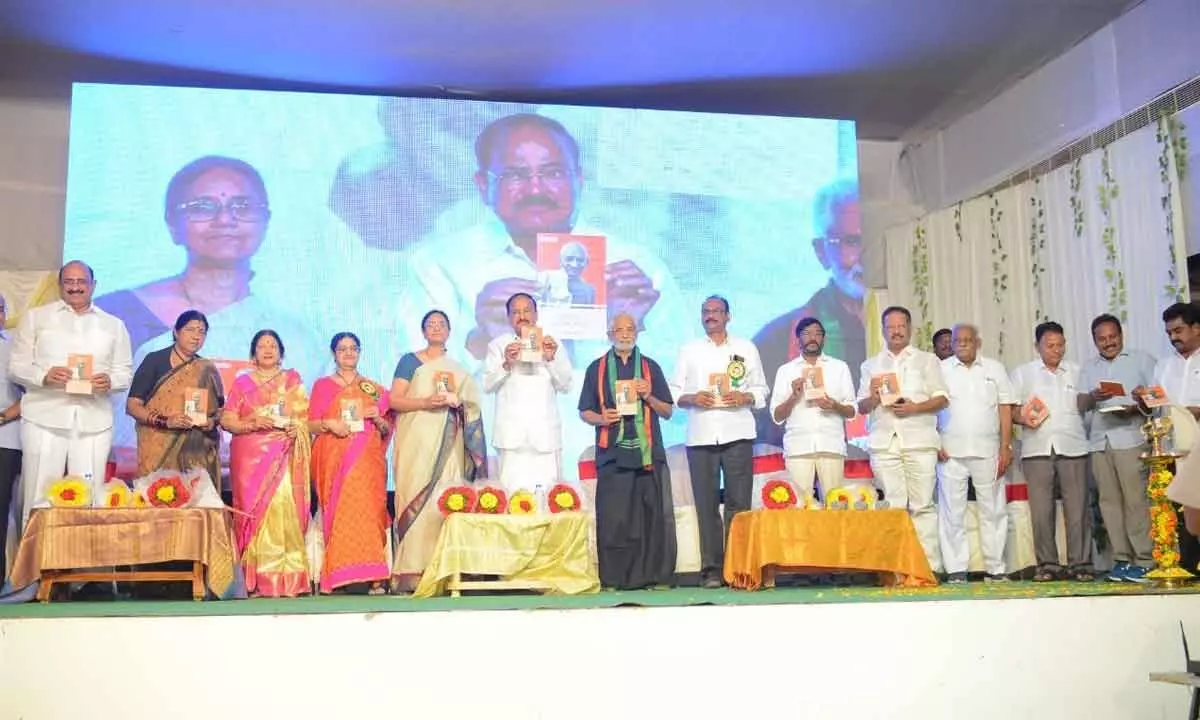 Former Vice-President M Venkaiah Naidu and others releasing a book on the life history of Mahatma Gandhi written by Chokkapu Venkataramana at a function organised in Tenali on Saturday as part of the birth centenary celebrations of former Chief Minister N T Rama Rao