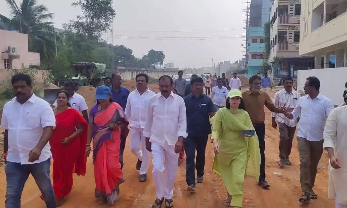 MLA Bhumana Karunakar Reddy along with Mayor Dr R Sirisha, Municipal Commissioner Anupama Anjali inspecting a Master Plan road in Tirupati on Saturday.