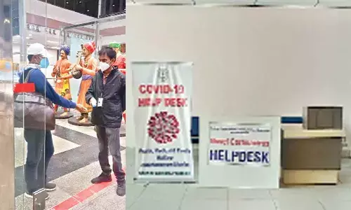 As a part of the Covid-19 preventive measures, a traveller going through thermal screening at Visakhapatnam Airport. ; Helpdesk facilitated at Visakhapatnam Airport